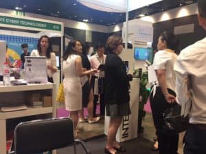 Intercorp staff attending to clients at the booth at SMEICC EXPO 2017, Suntec Convention Hall