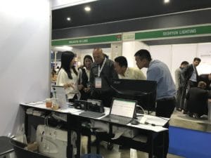 A staff introducing intercorp to a group of people at Intercorp booth, Thailand BMAM & Green Building Conference 2017, Bangkok
